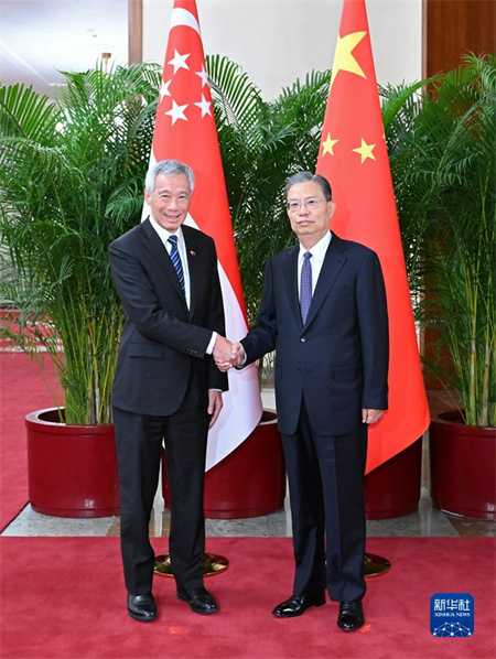 赵乐际分别会见新加坡总理、西班牙首相、马来西亚总理